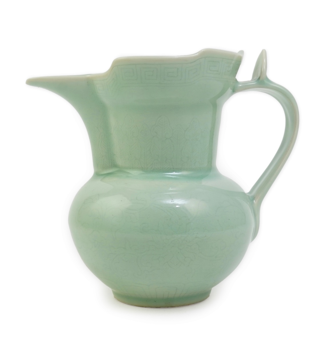 A Chinese incised celadon glazed monks cap ewer, Qianlong seal mark but later, 17cm